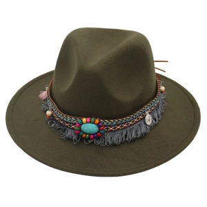 Detail of olive green felt hat with ethnic woven band, turquoise bead and grey tassels