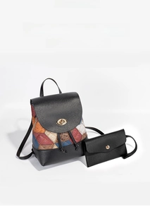 Detail view of drawstring bucket backpack and matching small pouch with geometric patterns