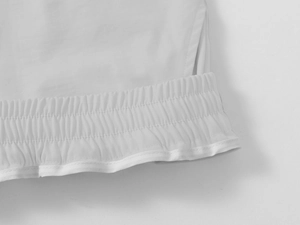 Close-up of elastic waistband with drawstring on men casual shorts in light gray