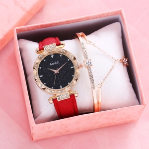 Set de reloj de cielo estrellado con correa roja y pulsera dorada en caja de regalo