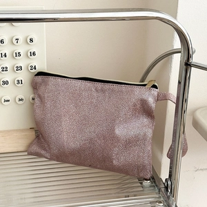 Pink glitter makeup bag with rose gold snake texture and portable side handle strap