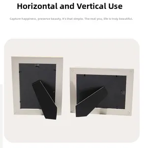 Rear view of white photo frames showing sturdy horizontal and vertical support stands