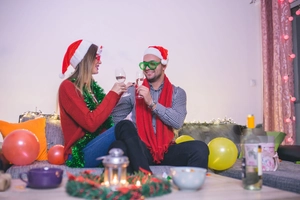 Festive Christmas party accessories featuring LED shutter glasses and holiday apparel