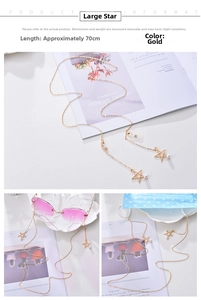 Detailed views of gold star chain with pearls used for glasses and face masks