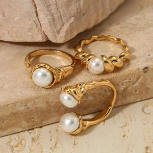 Three-piece vintage gold stainless steel ring set with elegant white shell pearls