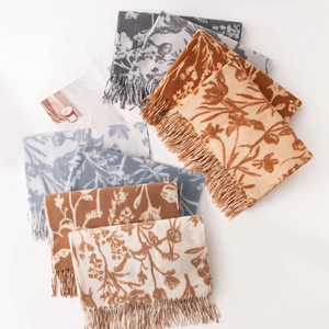 Elegant floral print pashmina scarves with tassel edges in assorted colors and patterns