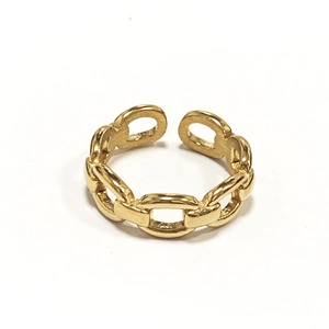Close-up of adjustable golden chain style ring featuring minimalist steel link design