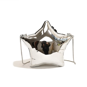 Shiny silver acrylic star-shaped mini clutch bag with slim metal chain shoulder strap
