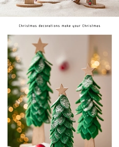 Three green felt Christmas trees with wooden stars on a warm festive background