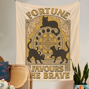 Detail of bohemian black cat tapestry with astrology chart and lunar phases on white wall