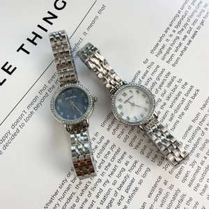Elegant silver metal strap ladies watches with blue and white diamond-encrusted dials