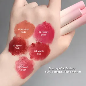Matte lip mud set with 5 shades on hand skin from orange to peach red colors