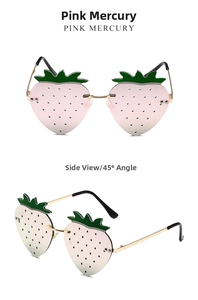 Close-up of strawberry shaped sunglasses with pink lenses and green leaf details