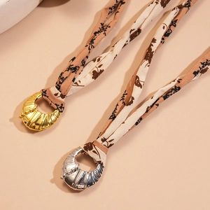 Floral fabric oval choker necklace with gold and silver croissant metal pendants