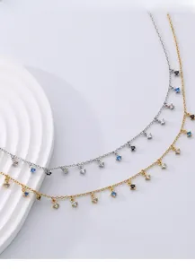 Macro view of 925 sterling silver necklace featuring vibrant colorful zircon fringe charms