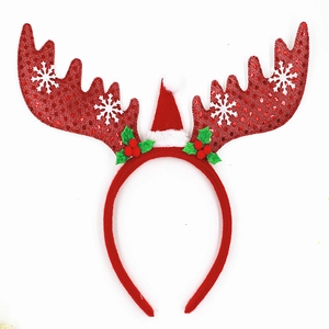 Christmas reindeer antler headband with sequins and a mini Santa hat on white background