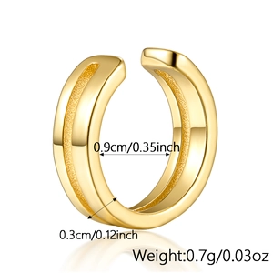 Macro view of gold ear cuff showing 0.9cm diameter and matte dual-texture detail