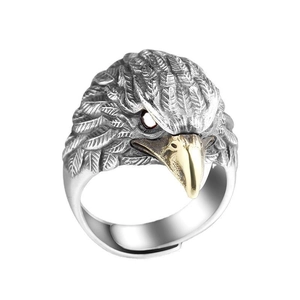 Vintage eagle head ring in antique silver with golden beak detail for men