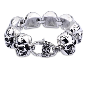 Rock style silver skull bracelet for men in durable stainless steel on white background