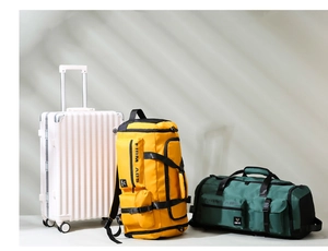 Travel luggage set with white suitcase and multi-purpose yellow and green gym bags