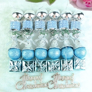 Christmas decoration set with blue and silver ornaments on white faux fur background