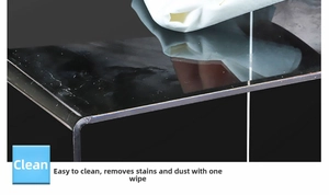 Macro detail of high-gloss black acrylic shelf showing stain-resistant mirror surface