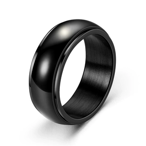Rotating black stainless steel meditation ring with polished and matte brushed finish