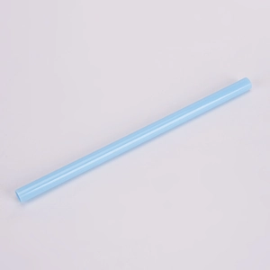 Detailed view of a light blue reusable Tritan straw on a clean white background