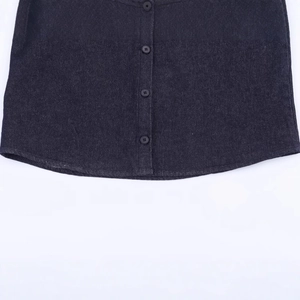 Deep blue denim shirt with buttoned placket and curved hem on white background