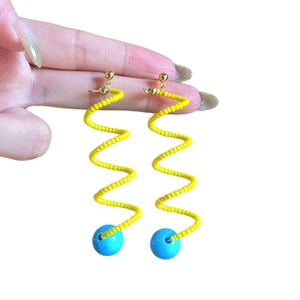 Handmade woven rattan earrings with yellow seed beads and blue round drop charms