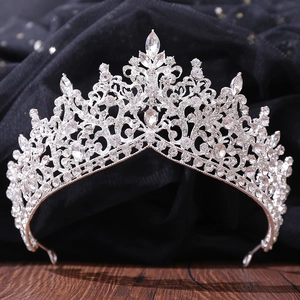 Macro detail of luxury silver crystal bridal tiara with intricate floral hollow design