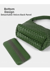 Detailed view of the removable rigid bottom with velcro for woven leather handbag