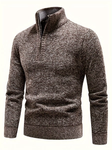 Close-up of brown-grey half-zip knit sweater showing fine texture and stand collar