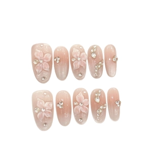 Handmade cat eye press-on nails with 3D pink flowers and sparkling zircon rhinestones