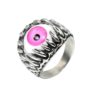 Pink evil eye stainless steel ring with gothic claw setting design on white background