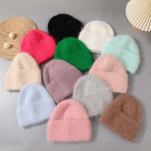 Winter angora rabbit fur knit beanies for women in multiple colors with fuzzy texture