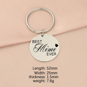 Macro detail of silver stainless steel keychain tag with BEST Mimi EVER engraved text