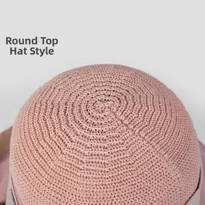 Detailed macro view showing the breathable woven crown of an elegant pink dome sun hat