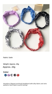 Close-up of vintage paisley twist headbands in satin fabric with multiple colors