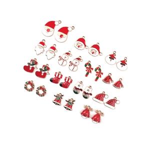 Christmas alloy charms collection featuring Santa, snowmen, and bells on white background