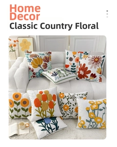 Detailed embroidery of colorful tulip and floral patterns on ivory farmhouse pillow covers