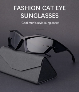 Close-up of black futuristic cat eye sunglasses with a stylish triangular eyewear case