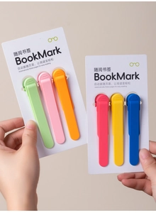 Close-up of flexible silicone automatic bookmarks in vibrant rainbow colors on a backcard