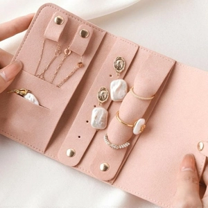 Pink microfiber jewelry organizer roll for necklaces rings and earrings storage