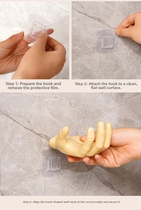 Three-step installation guide for hand-shaped wall hook with strong adhesive base