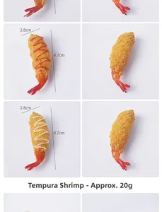 Detailed view of tempura shrimp keychain with yellow breading and dimensions 9.7cm x 2.8cm