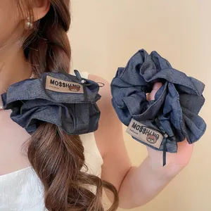 Denim fabric scrunchie with cute bear label for women's elegant ponytail hairstyles