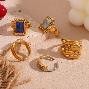 Collection of vintage 18K gold plated stainless steel rings with natural stone inlays