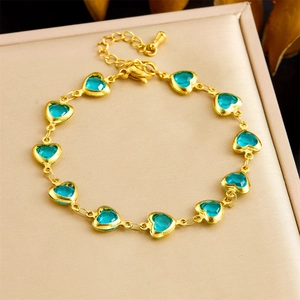 Bracelet doré en acier inoxydable avec cœurs en cristal bleu et chaîne de réglage ajustable