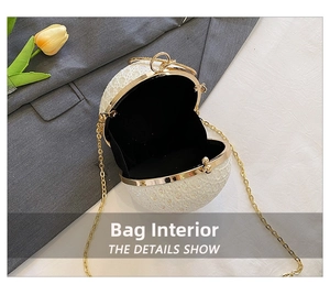 Detail view of the elegant ball-shaped evening bag with lace sequins and gold chain
